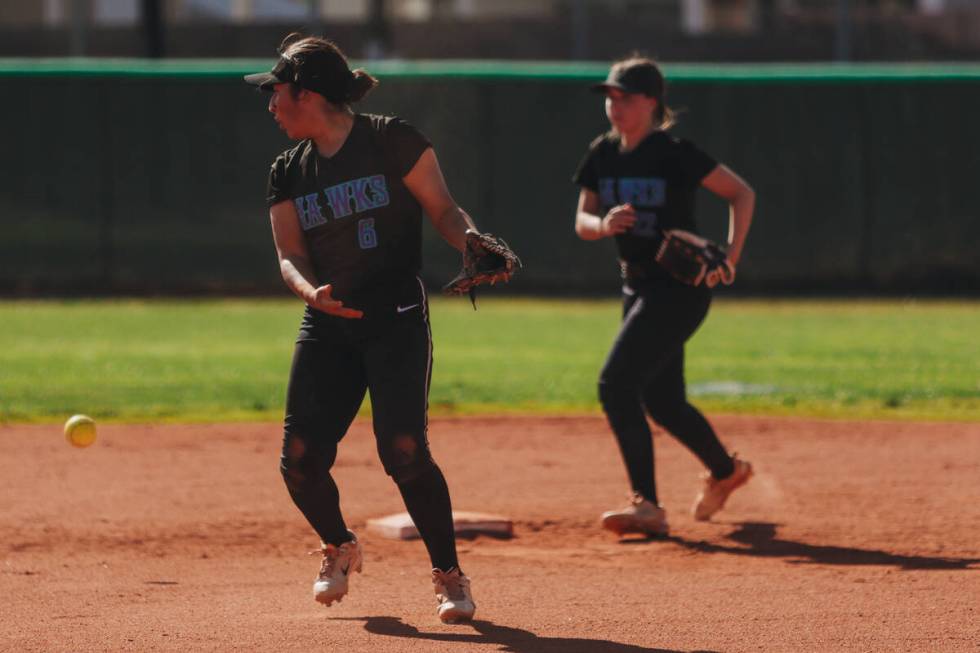 Silverado players lose the ball during a softball game between Silverado and Green Valley at Gr ...