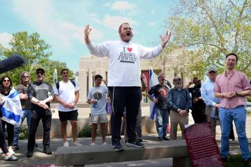 Rabbi Levi Cunin, with Chabad on Campus, speaks during a pro-Israel rally at Indiana University ...