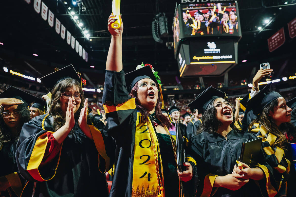 Graduates participate in the Nevada State University commencement ceremony at Thomas & Mack ...