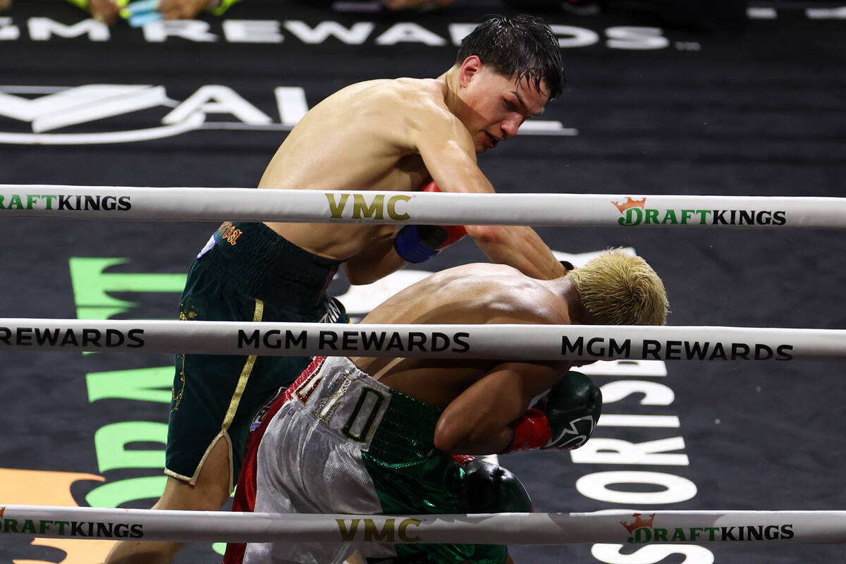 Brandon Figueroa, left, punches Jessie Magdaleno before knocking him out during a WBC interim w ...