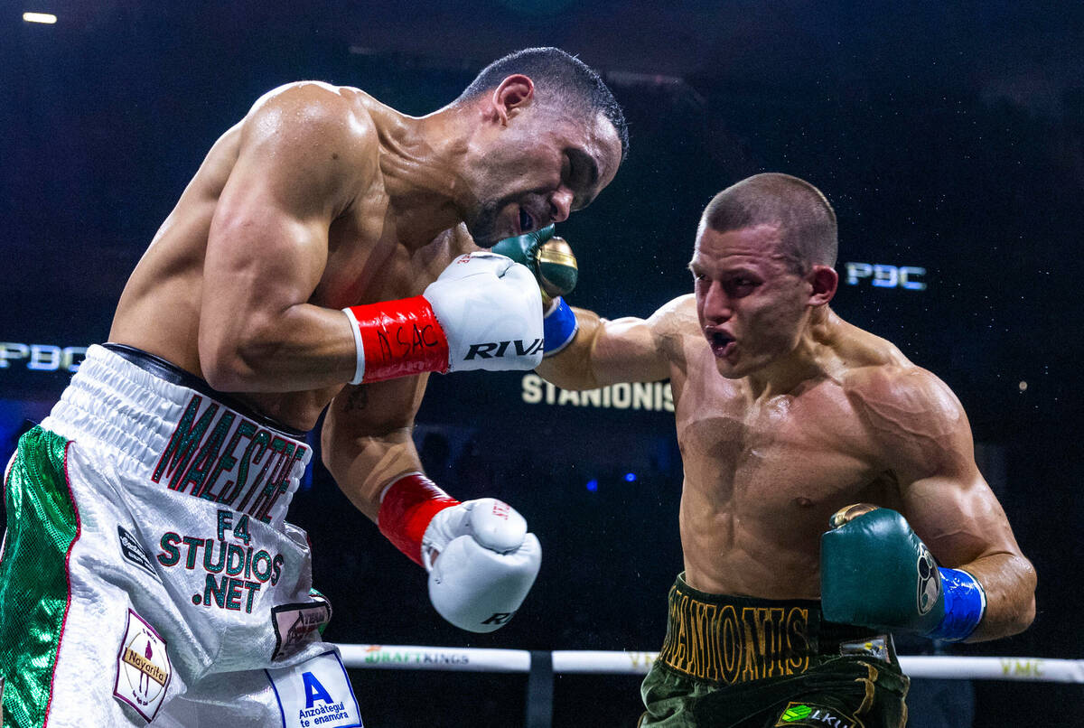 Wewlterweight Gabriel Maestre, left, takes a punch to the chin by Eimantas Stanionis during the ...