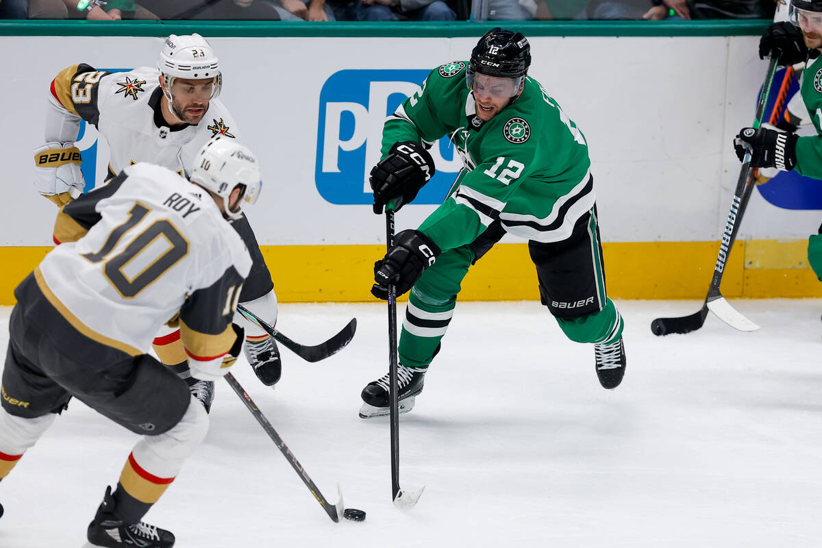 Dallas Stars center Radek Faksa (12) competes for the puck against Vegas Golden Knights center ...