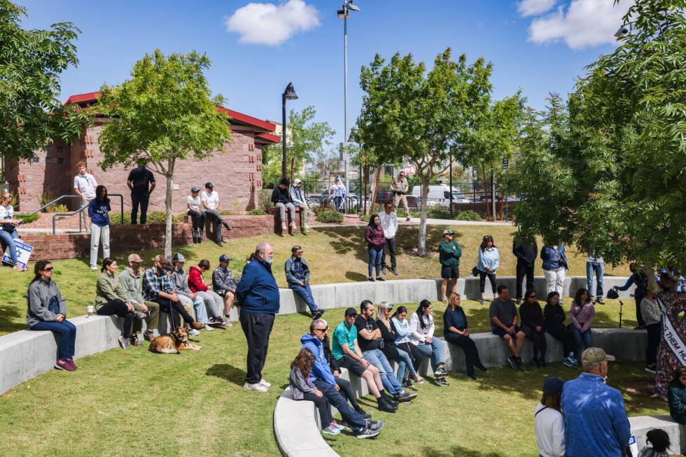 Participants listen during a rally hosted by the Las Vegas chapter of the Israeli-American Coun ...