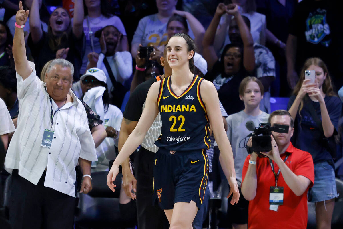 Indiana Fever guard Caitlin Clark (22) reacts after a loss to the Dallas Wings during an WNBA b ...