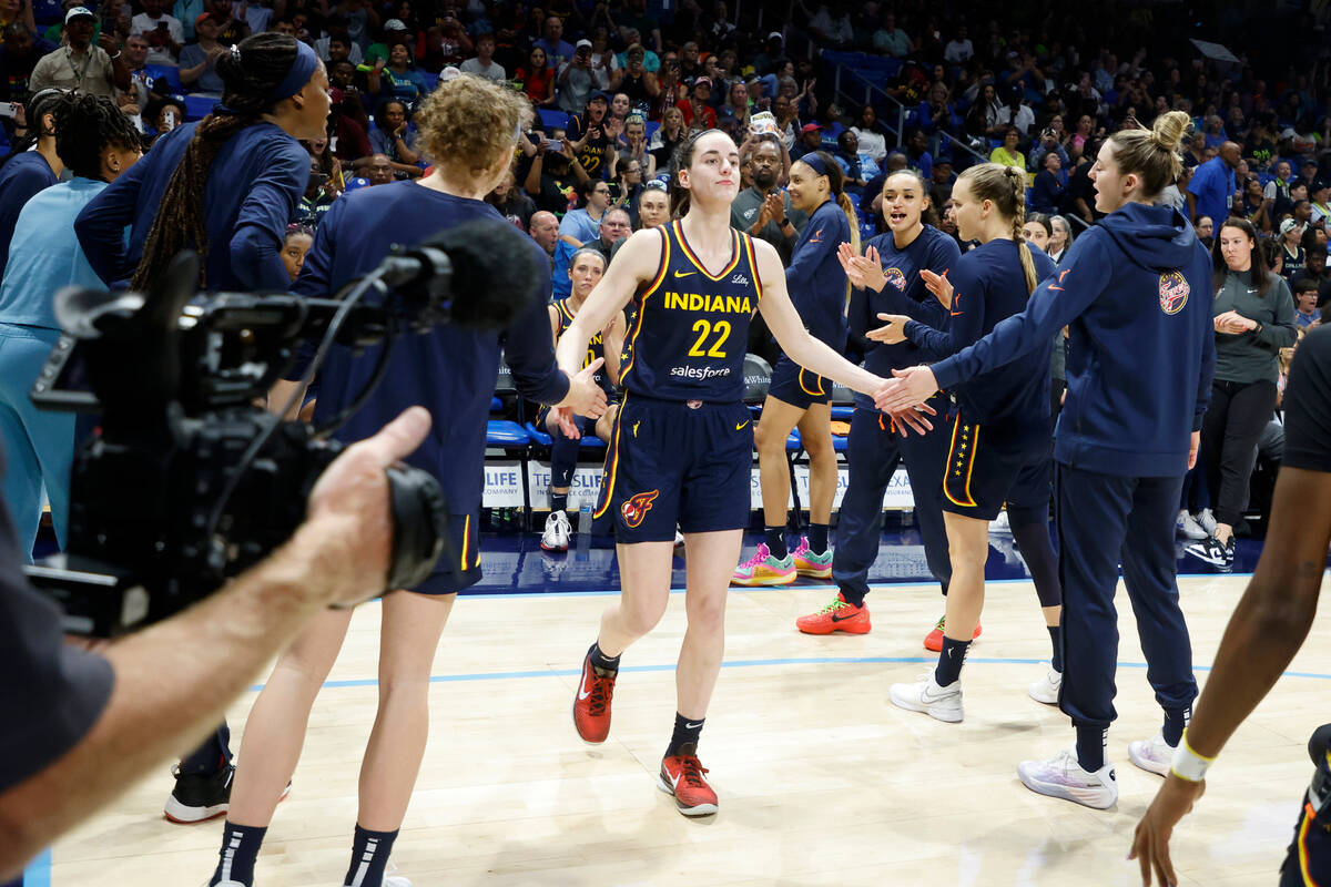 Indiana Fever guard Caitlin Clark (22) is introduced prior to an WNBA basketball game against t ...