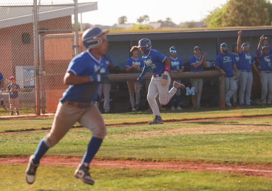 Green Valley's infielder Caden Kirby (12) heads to first base to score a run during a high scho ...