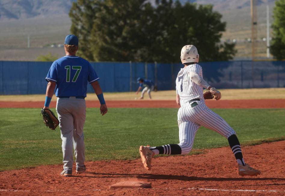 Shadow Ridge's Brock Morrow (7) rounds first base past Green Valley's Connor Apeceche (17) duri ...