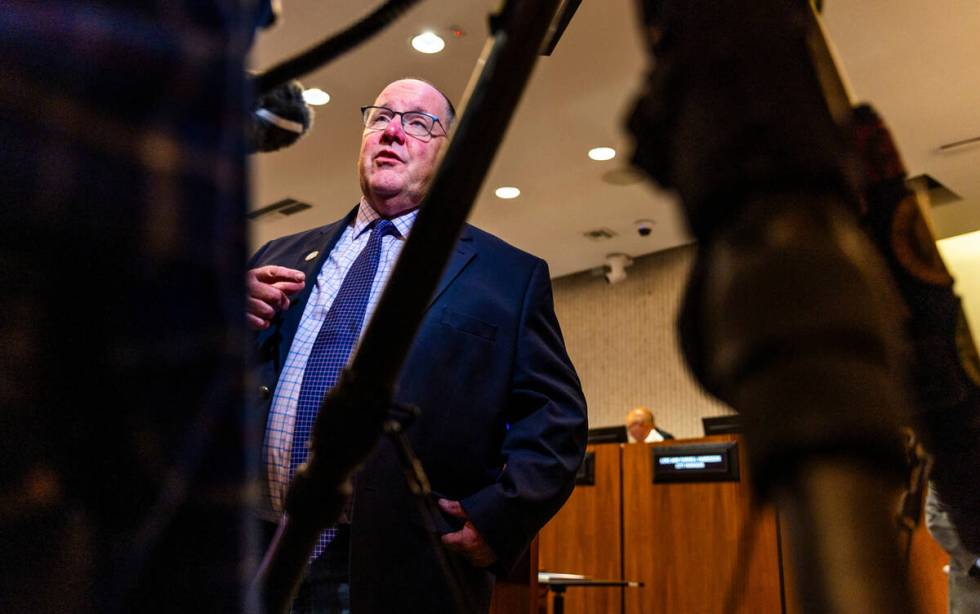 Mayor John Stephens speaks with a media member as the City of Costa Mesa discusses whether to s ...