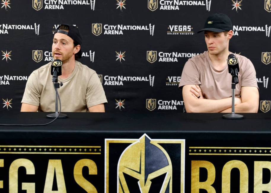 Golden Knights right wing Jonathan Marchessault, left, speaks as defenseman Braydon McNabb look ...