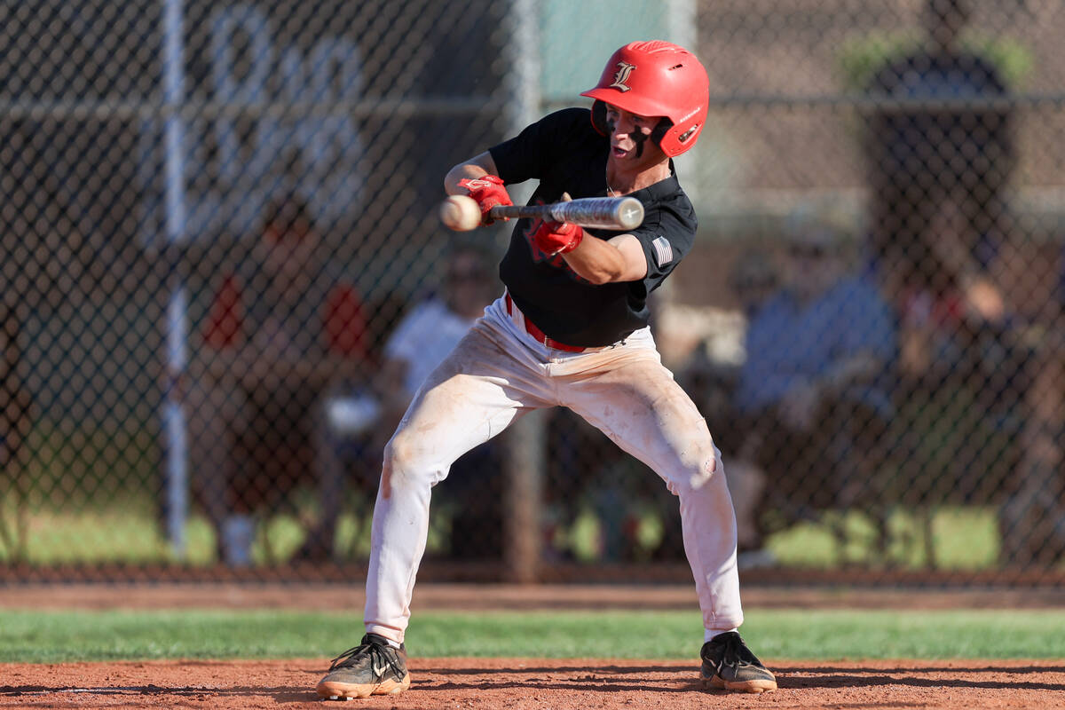 Liberty's Konner Brown (7) bunts against Las Vegas during a Class 5A high school baseball South ...