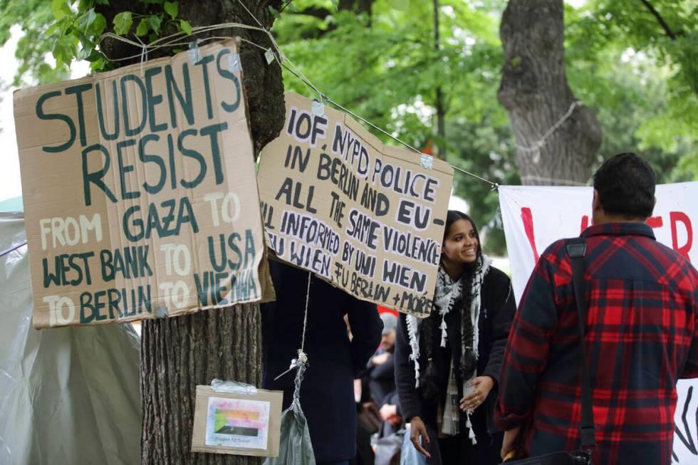 People attend a pro-Palestinians protest camp at the Vienna University Campus in Vienna, Austri ...