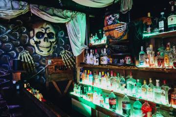 A bar equipped with pirate decor is seen inside of a pirate-themed house on Wednesday, July 26, ...