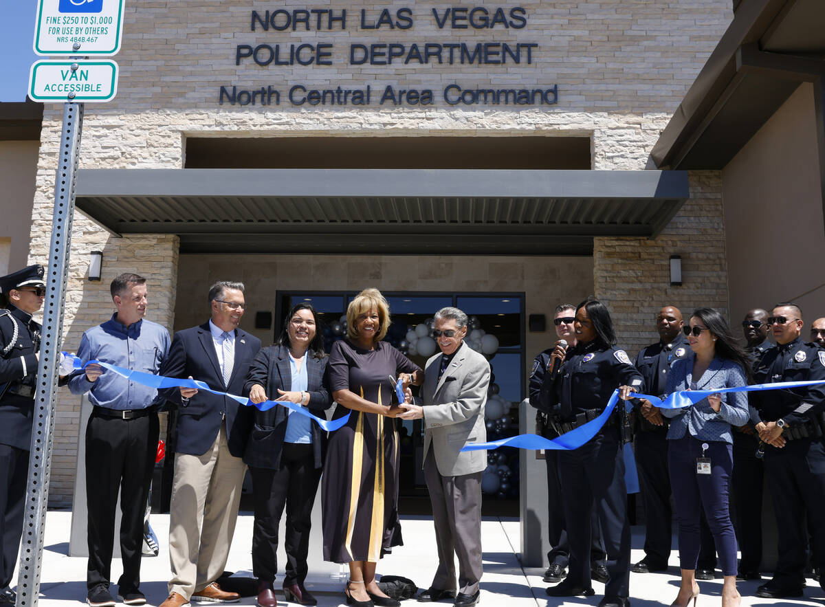 Guests, including North Las Vegas Mayor Pamela Goynes-Brown, center, Councilman Richard Cherchi ...