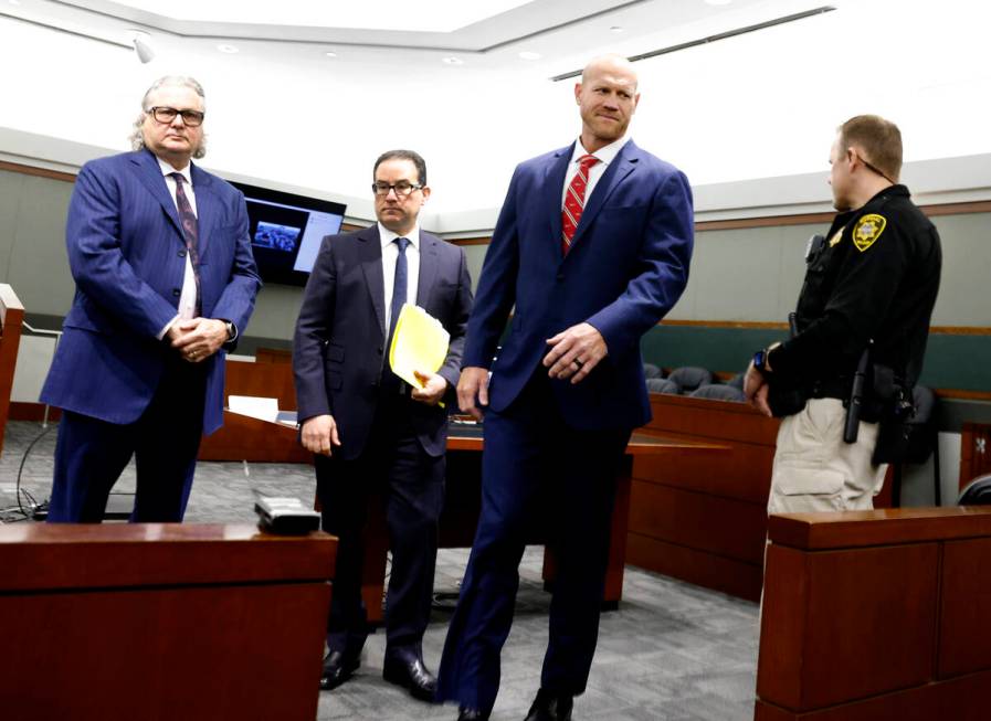 Daniel Rodimer, second from right, leaves court with his attorneys David Chesnoff, left, and Ri ...