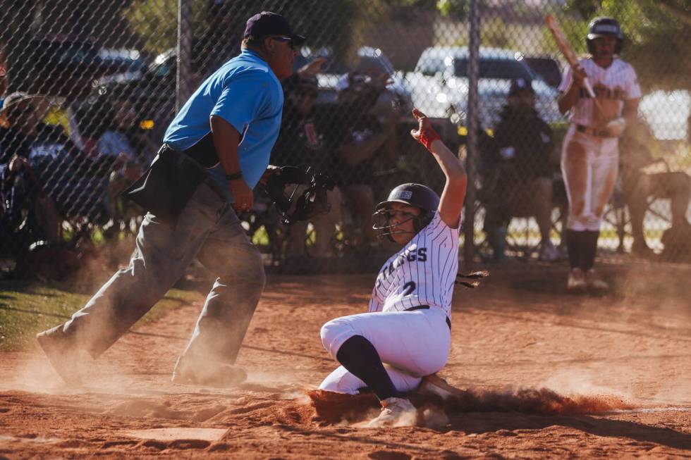 Shadow Ridge’s Carmella Garganese (2) slides to home base during a Class 5A Southern Reg ...