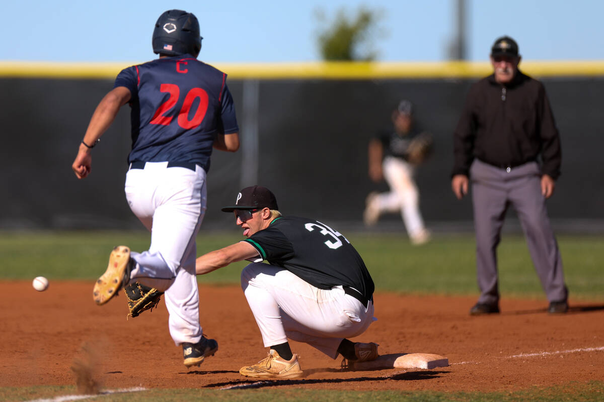 Palo Verde first baseman Kyle Johnson (34) prepares to catch for an out on Coronado’s Ja ...