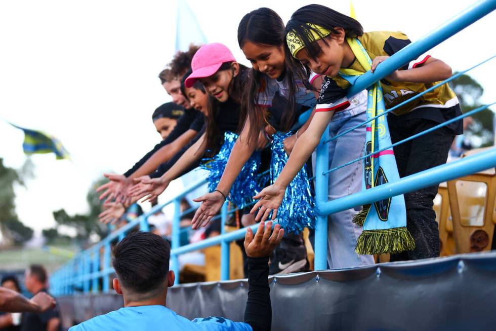 Las Vegas Lights FC fans greet players as they take the field for a U.S. Open Cup round of 32 s ...