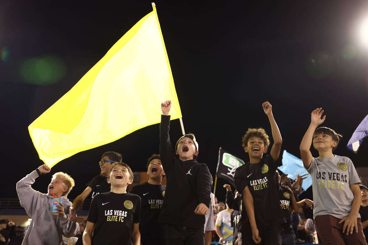 Las Vegas Lights FC fans cheer for their team during the second half of a U.S. Open Cup round o ...