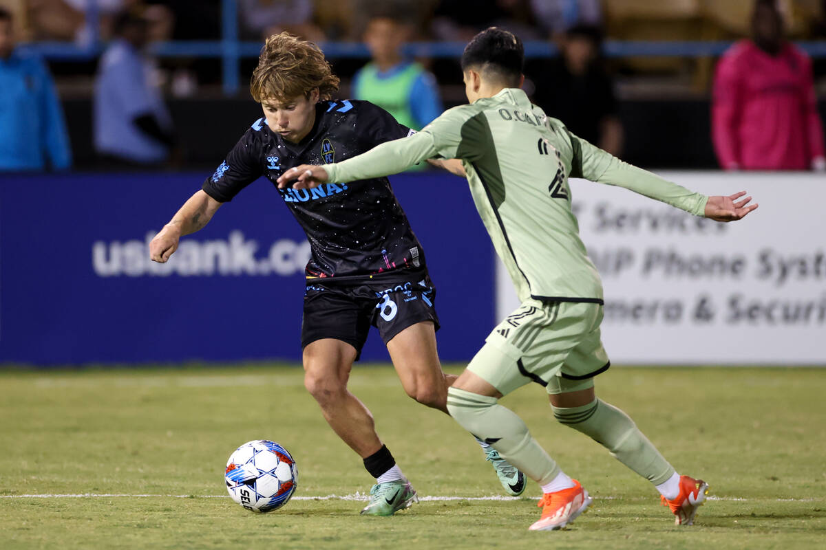 Las Vegas Lights FC forward Coleman Gannon (8) drives toward the net against Los Angeles FC def ...