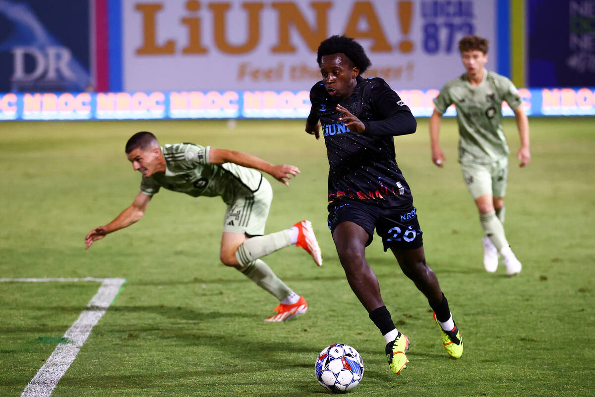 Las Vegas Lights FC midfielder J.C. Ngando drives toward the net during the second half of a U. ...