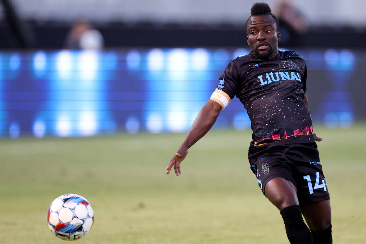 Las Vegas Lights FC midfielder Solomon Asante (14) works to keep the ball in bounds during a U. ...