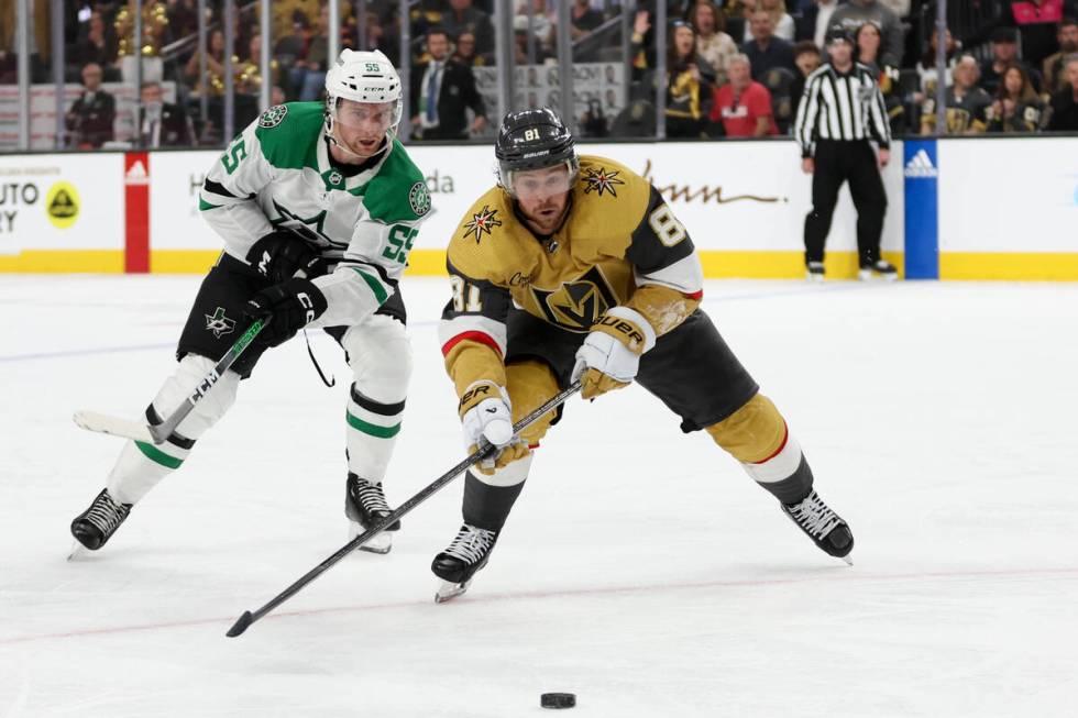 Golden Knights right wing Jonathan Marchessault (81) and Stars defenseman Thomas Harley (55) dr ...