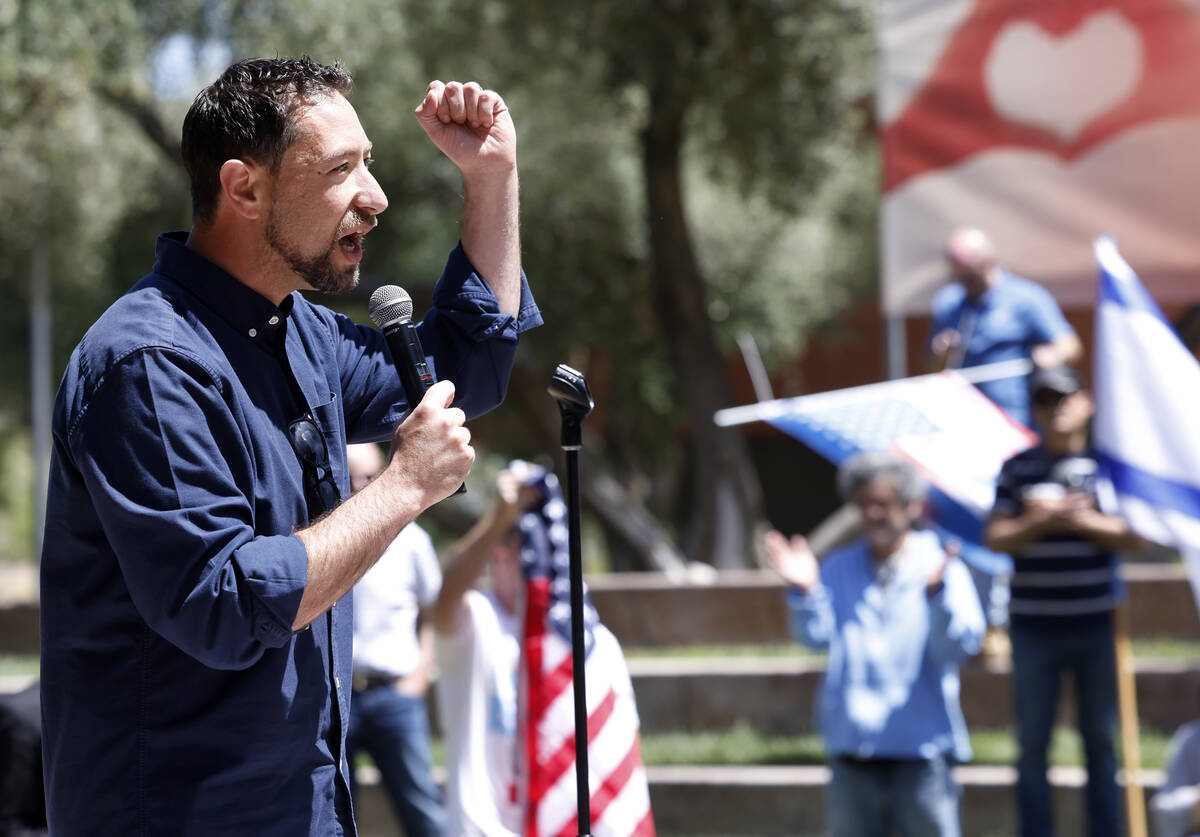 Commissioner Michael Naft speaks during a rally against antisemitism at UNLV, on Monday, May 6, ...