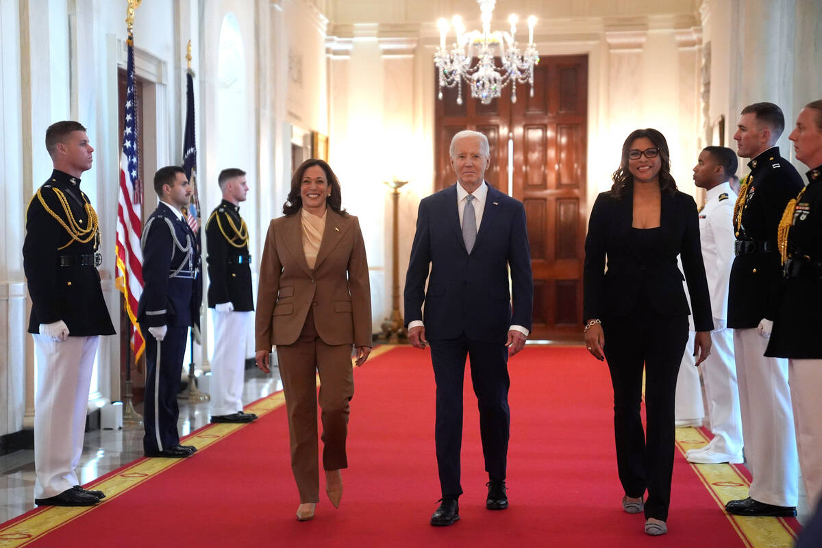 Vice President Kamala Harris, from left, President Joe Biden and Nikki Fargas, president of the ...
