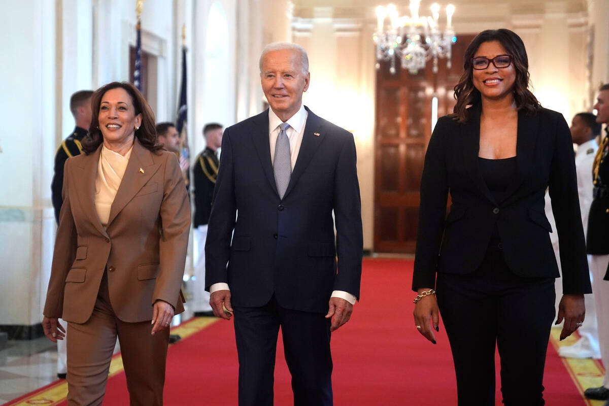 Vice President Kamala Harris, from left, President Joe Biden and Nikki Fargas, president of the ...