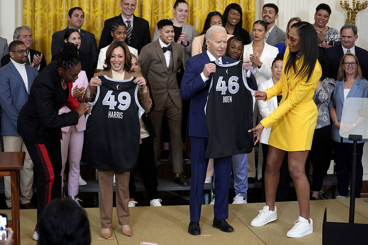 A'ja Wilson, right, and right, Chelsea Gray, left, of the WNBA's Las Vegas Aces, present jersey ...