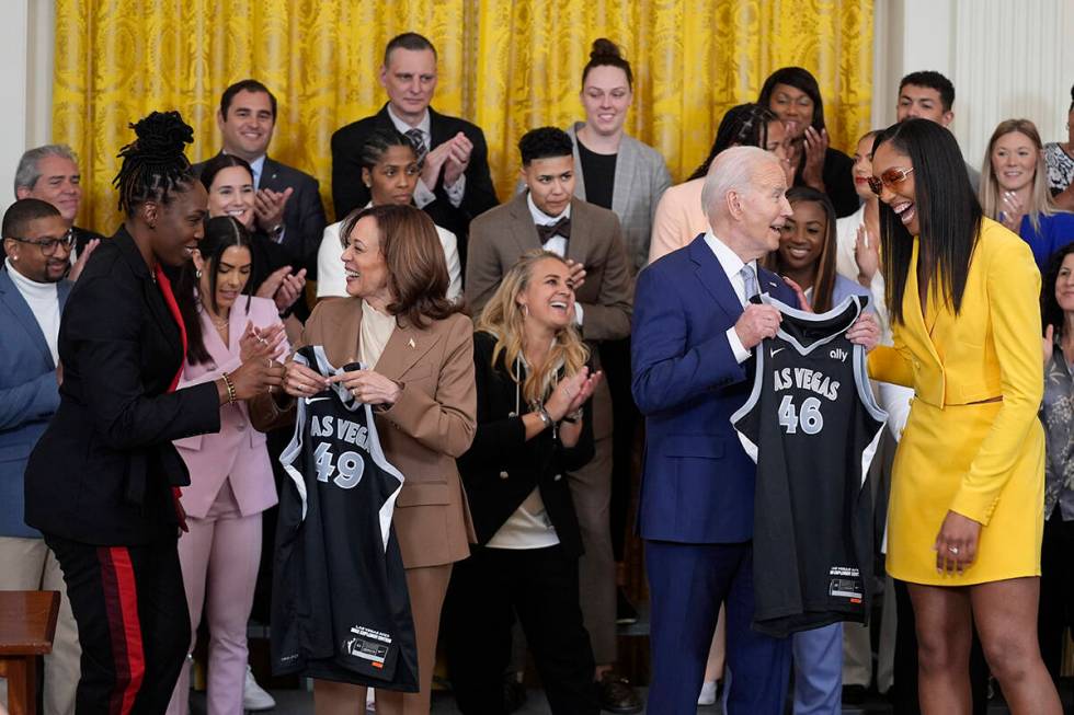 A'ja Wilson, right, and right, Chelsea Gray, left, of the WNBA's Las Vegas Aces, present jersey ...