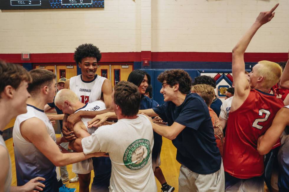 Coronado players and students from the student section celebrate Coronado winning during a Clas ...