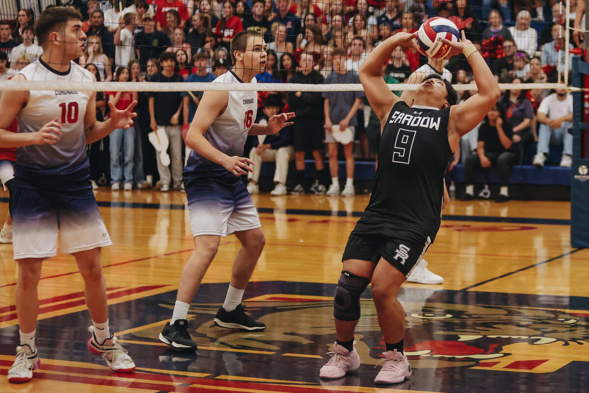 Shadow Ridge setter Angel Lopez (9) bumps the ball during a Class 5A high school boys volleybal ...