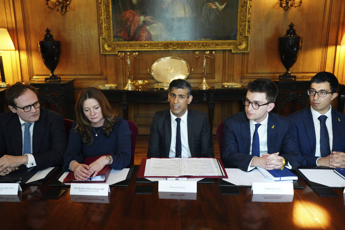 Britain's Prime Minister Rishi Sunak, center, and Education Secretary Gillian Keegan, center le ...