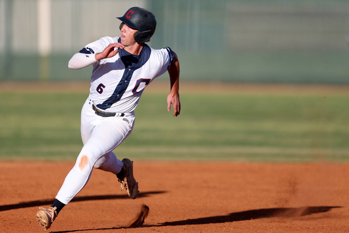 Coronado’s Louis Dion (6) sprints to third base during a Class 5A high school baseball S ...