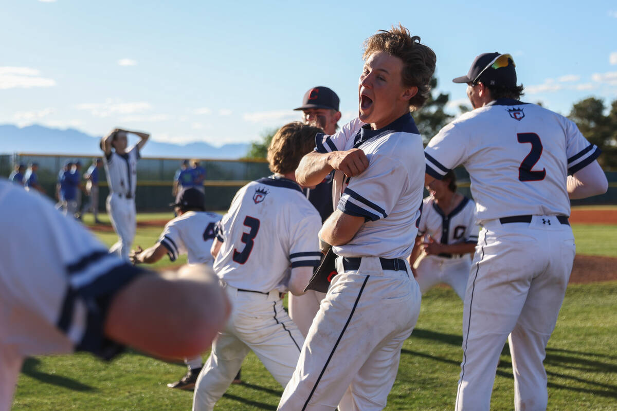 Coronado second baseman Jackson Thomsen, center right, celebrates with his team after winning a ...