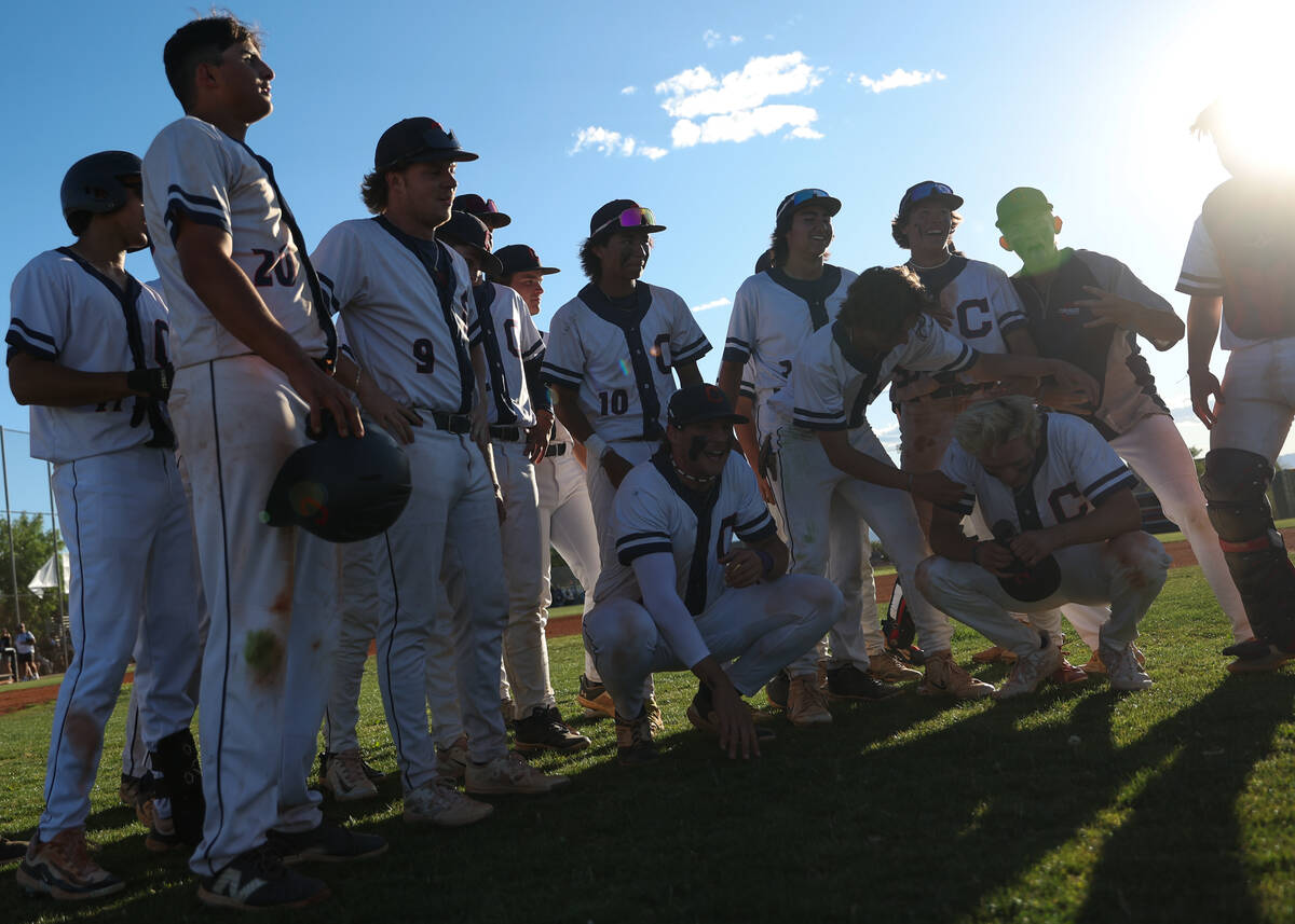 Coronado huddles after winning a Class 5A high school baseball Southern Region playoff game aga ...