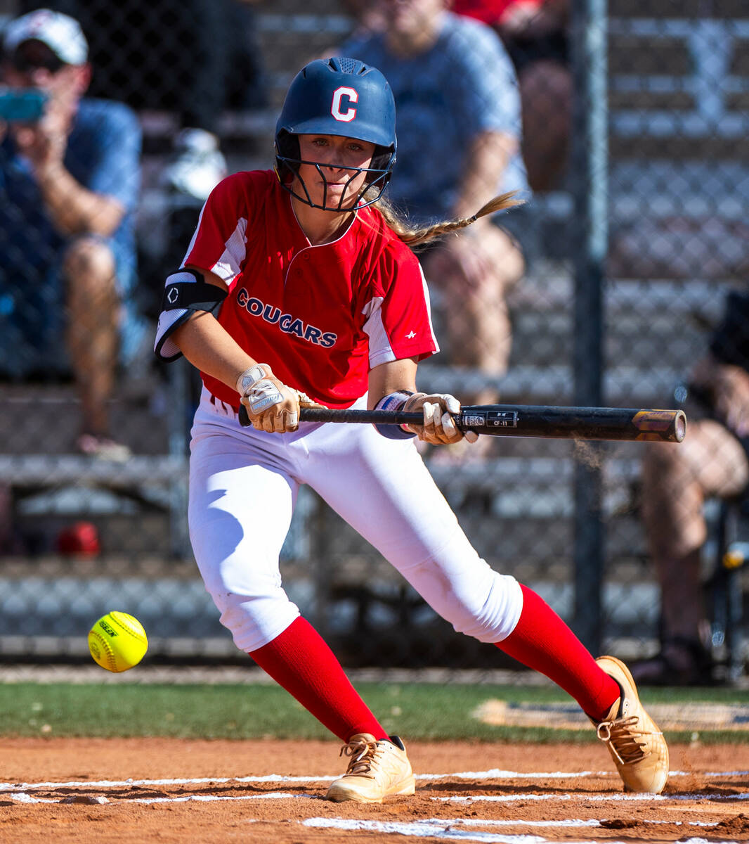 Coronado batter Sophie Bendlin (6) bunts a Shadow Ridge pitch during the first inning of their ...