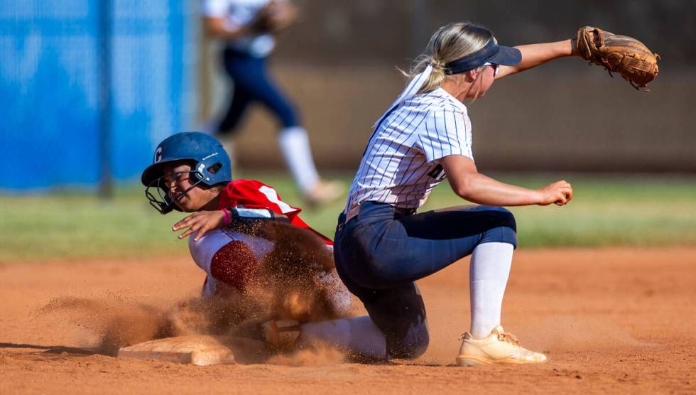 Shadow Ridge infielder Stevie Robison (1) makes the out at second base as Coronado base runner ...