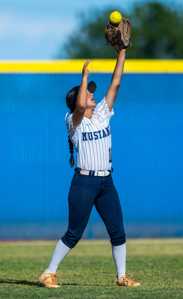 Shadow Ridge outfielder Alina Pavlovich (11) grabs a fly ball for an out against Coronado durin ...