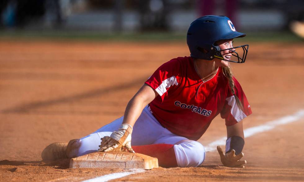 Coronado runner Sophie Bendlin (6) is pleased to be safe at third base against Shadow Ridge dur ...