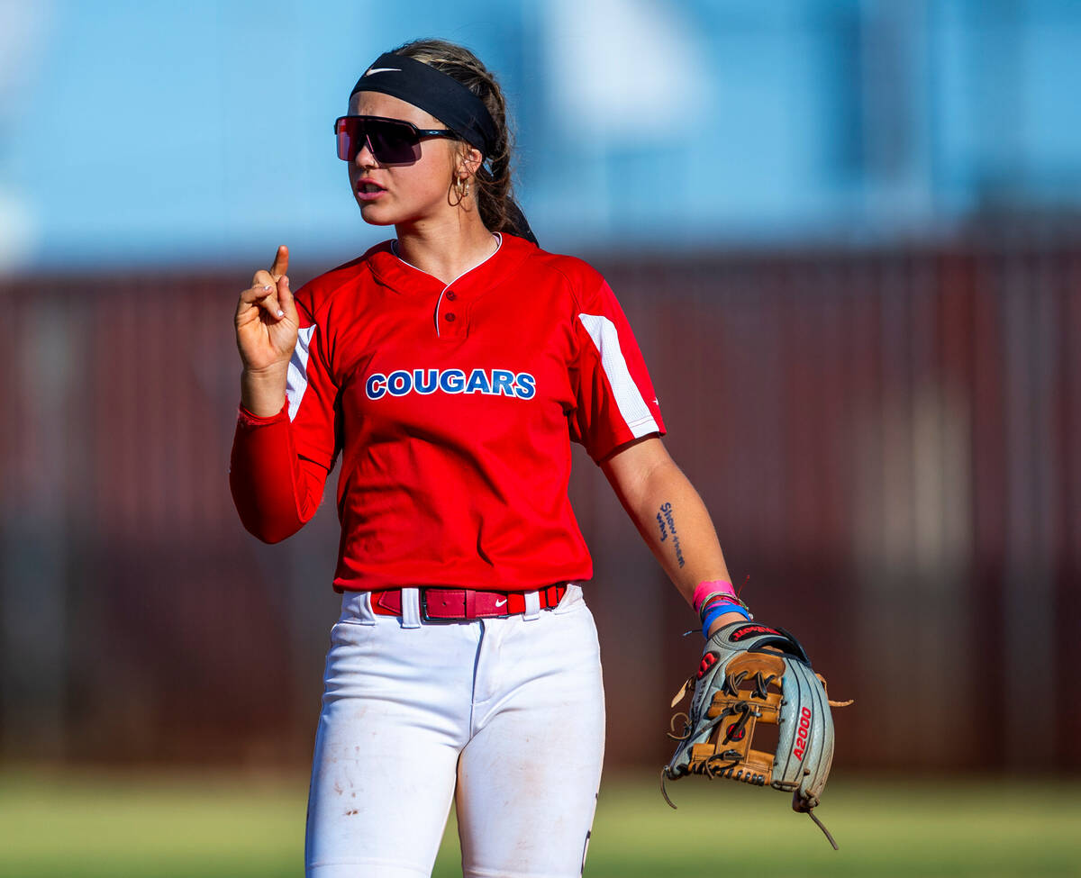 Coronado infielder Bailey Goldberg (1) is pleased with another out against Shadow Ridge during ...