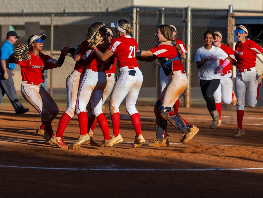 Coronado players celebrate their 4-2 win over Shadow Ridge following the seventh inning of thei ...