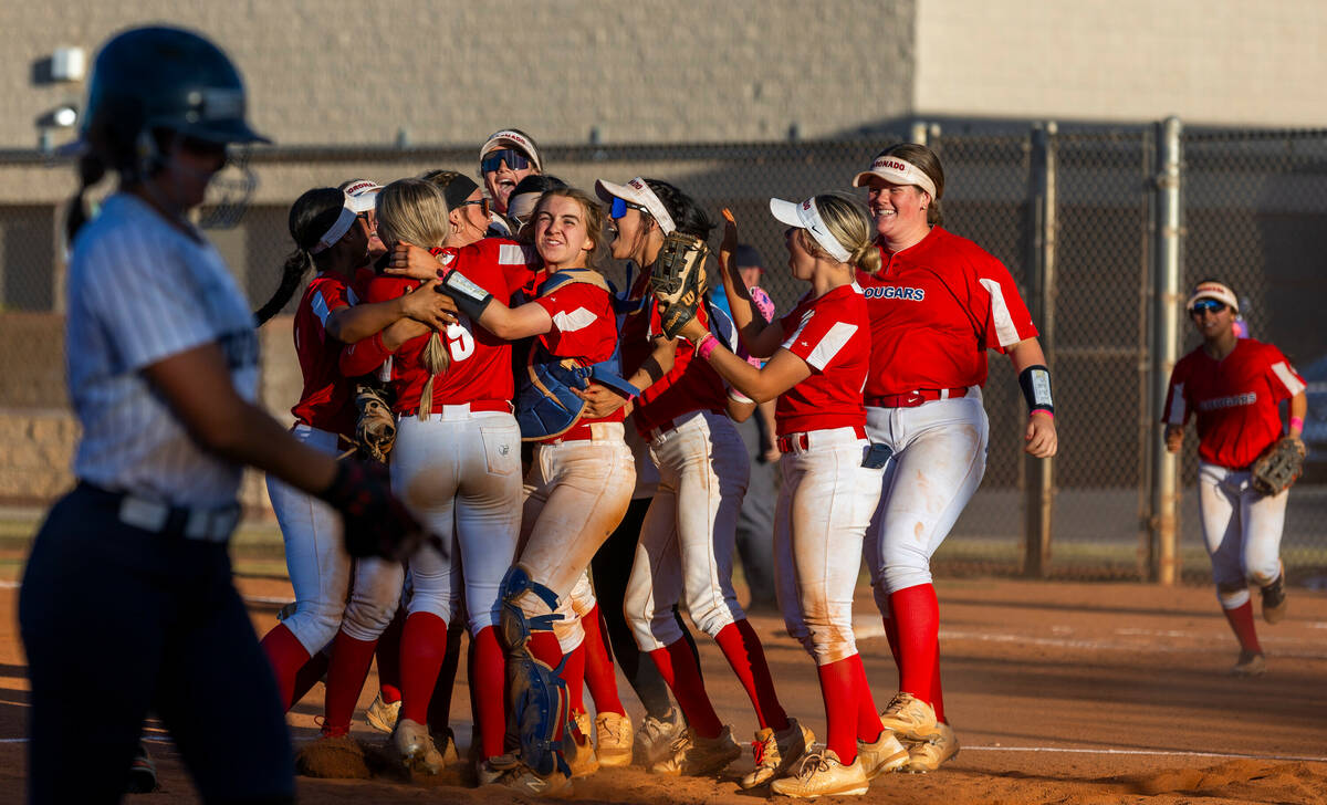 Coronado players celebrate their 4-2 win over Shadow Ridge following the seventh inning of thei ...