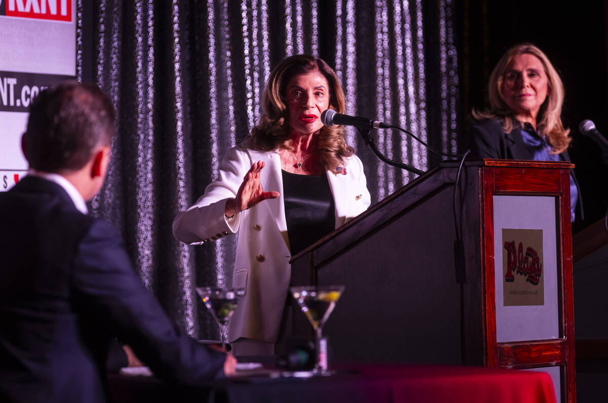 Former U.S. Rep. Shelley Berkley, left, speaks alongside Councilwoman Victoria Seaman, right, ...