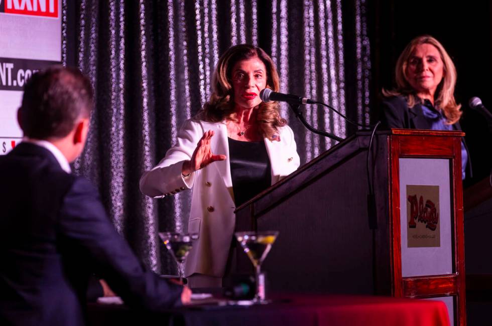 Former U.S. Rep. Shelley Berkley, left, speaks alongside Councilwoman Victoria Seaman, right, ...