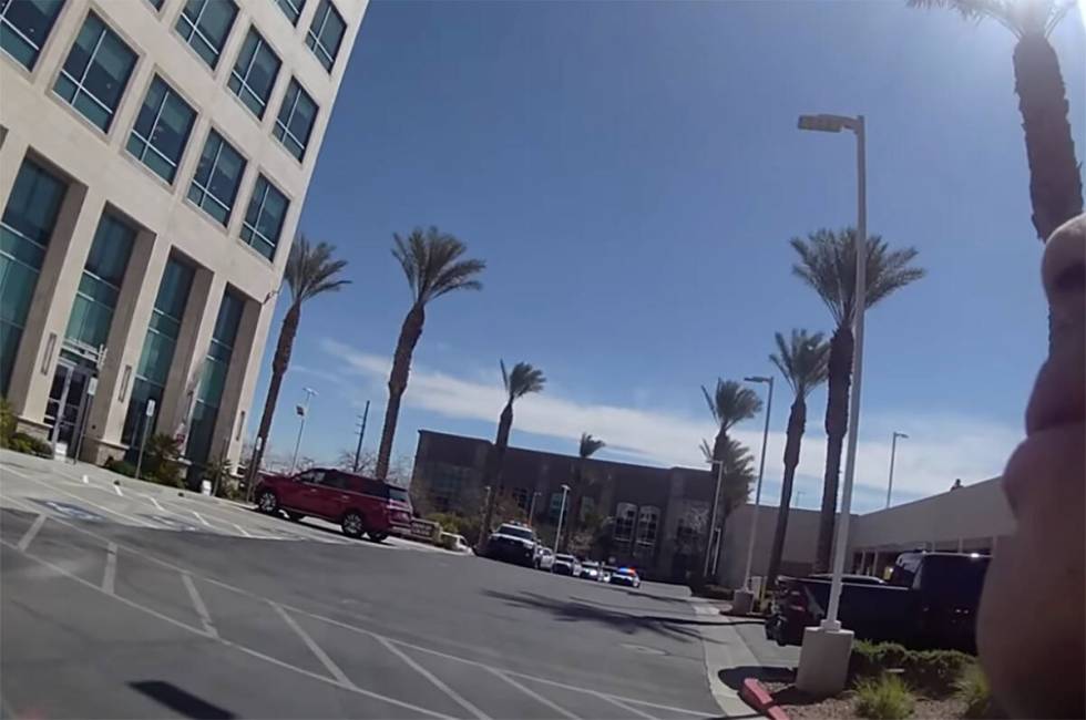 A screenshot from a Metropolitan Police Department body camera as police arrive at the fatal sh ...