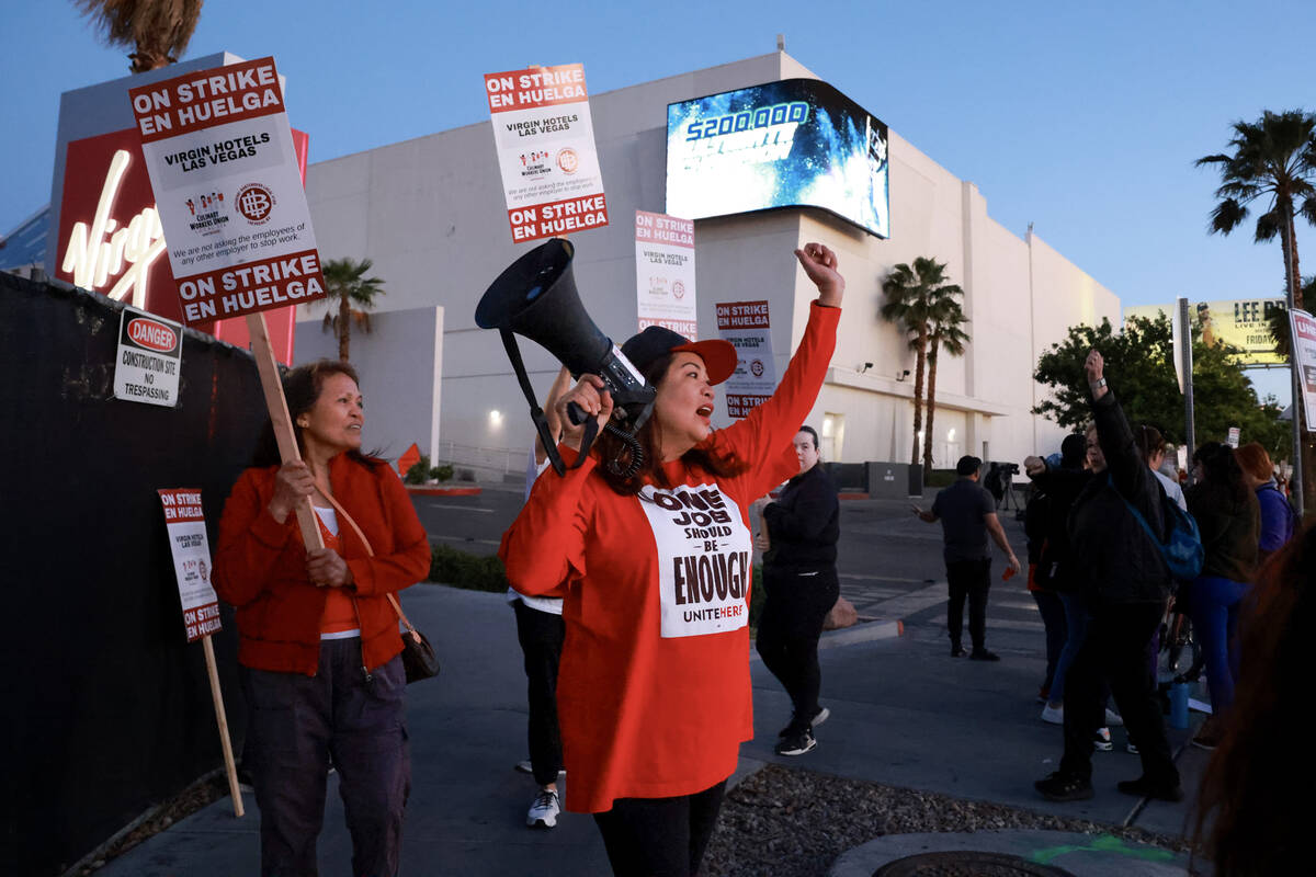 Culinary Local 226 members picket at the start of a 48 hour strike at Virgin Hotels in Las Vega ...