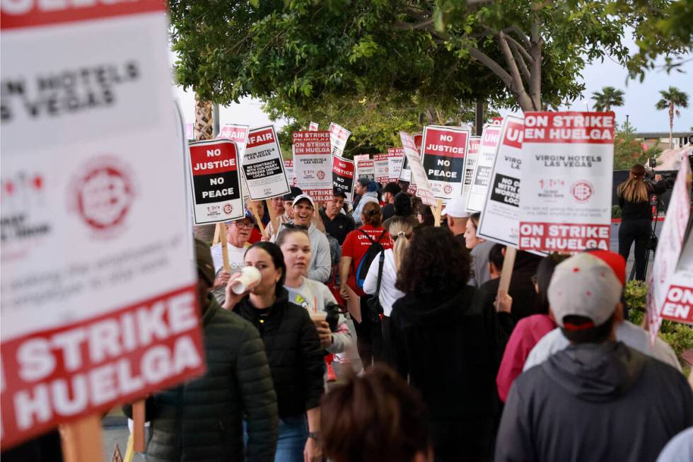 Culinary Local 226 members walk the picket line at the start of a 48 hour strike at Virgin Hote ...