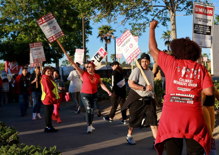 Culinary Local 226 members walk the picket line at the start of a 48 hour strike at Virgin Hote ...